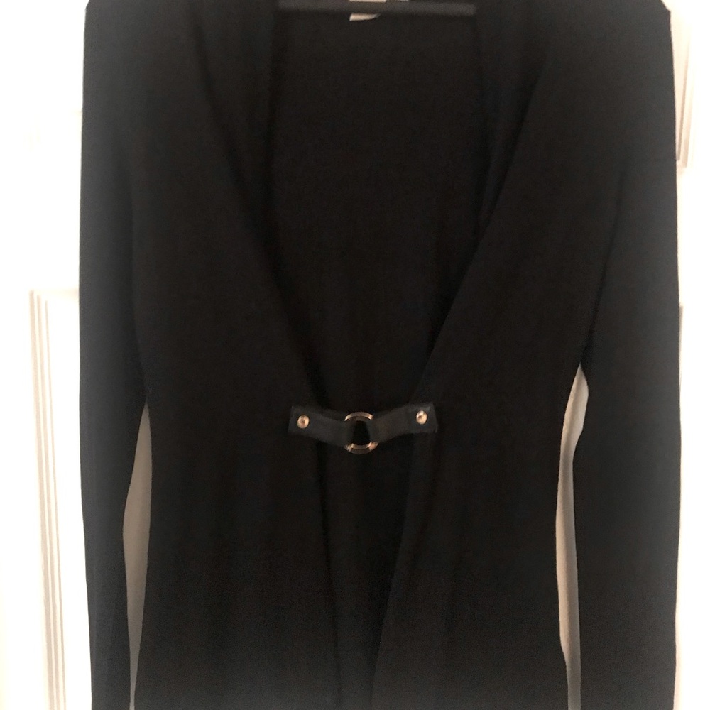 Michael Kohrs lightweight sweater w leather belt.